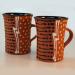 John Clift. Pair of mugs